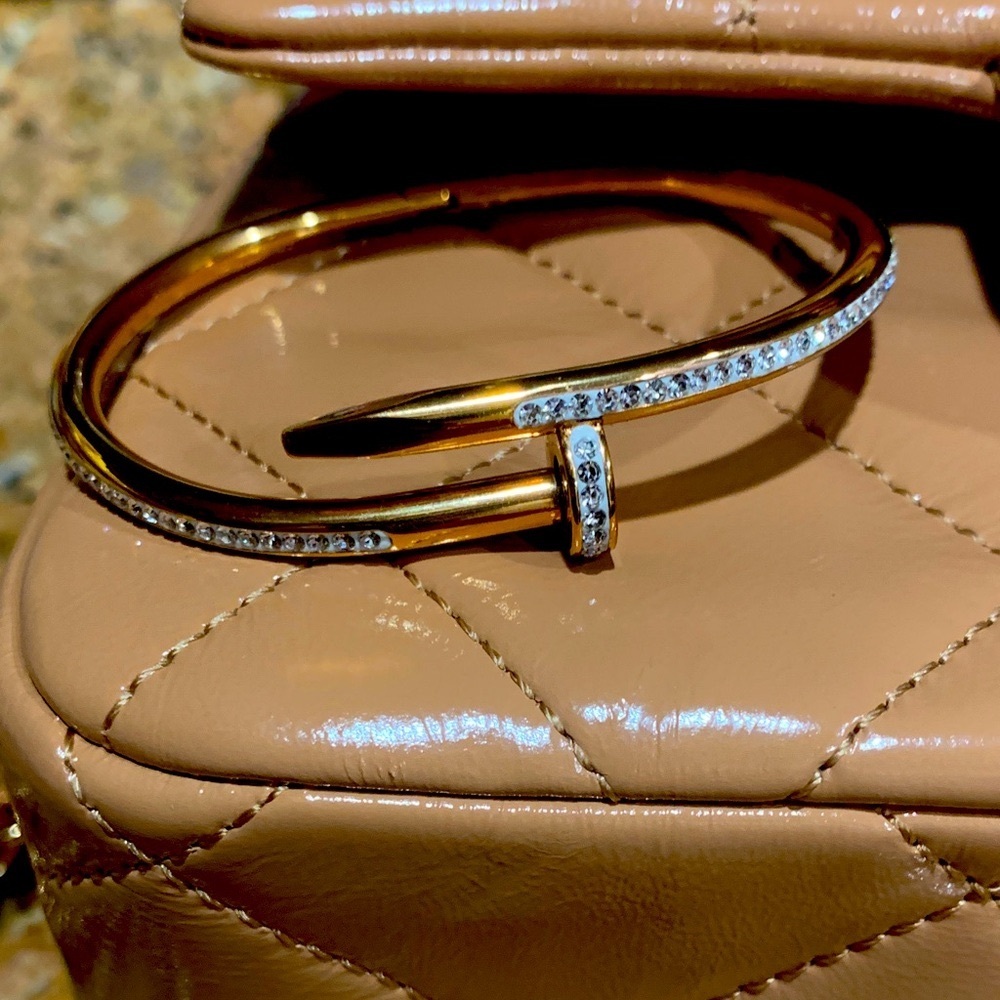 Absolutely stunning design Gold plated Nail Bracelet with Crystals,new condition